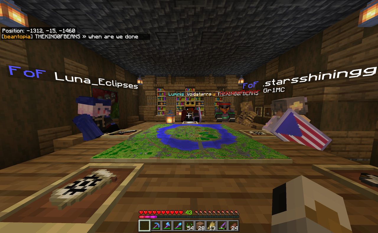 Players gathered around a war map table